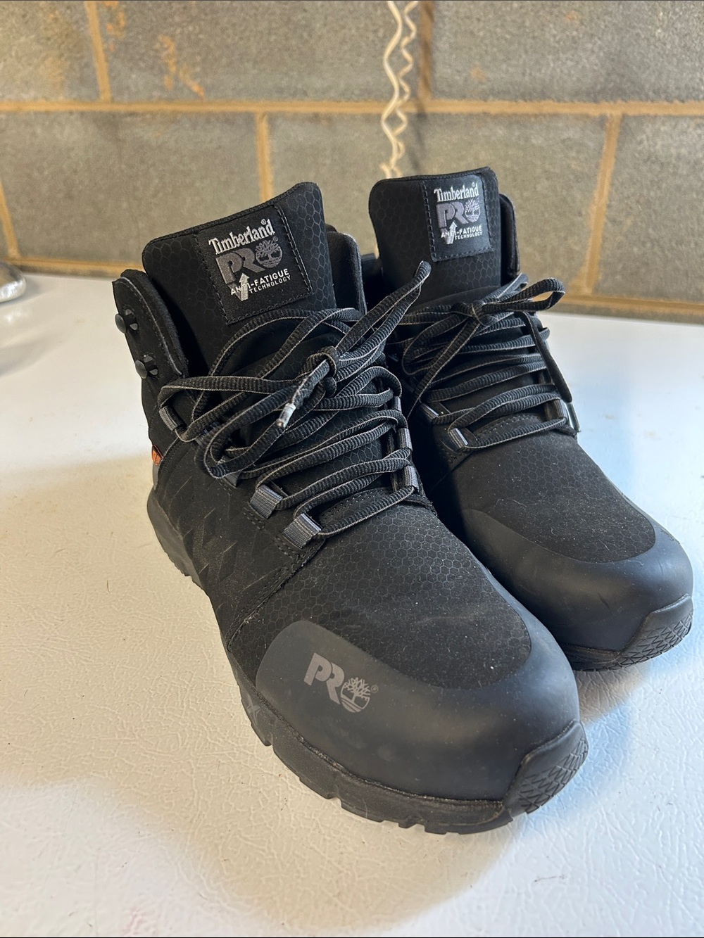 Timberland PRO Men's Black Work Boots with Subtle Orange Accent